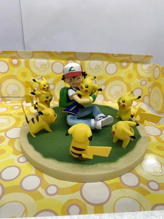 Figurine Pokémon Sacha et Plein de Pikachu